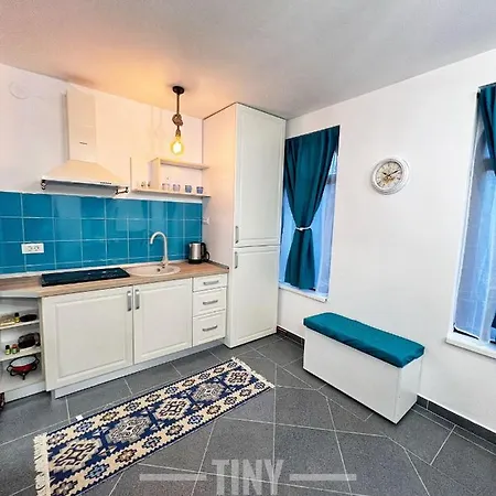 Tiny *